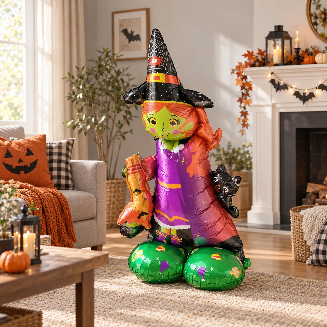 Witch standing foil balloon decoration for Halloween party indoors