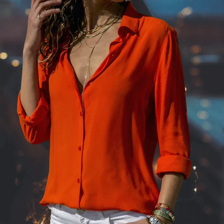 Women's classic button-up relaxed fit blouse shown from the side in casual style