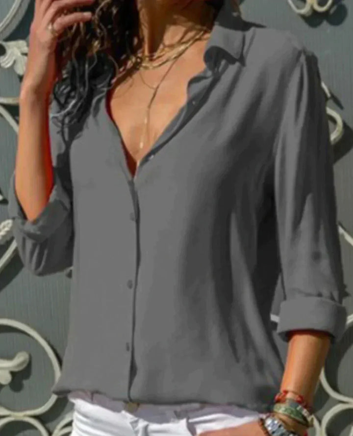 Close-up of cuff detail on womens casual top and classic blouse sleeve