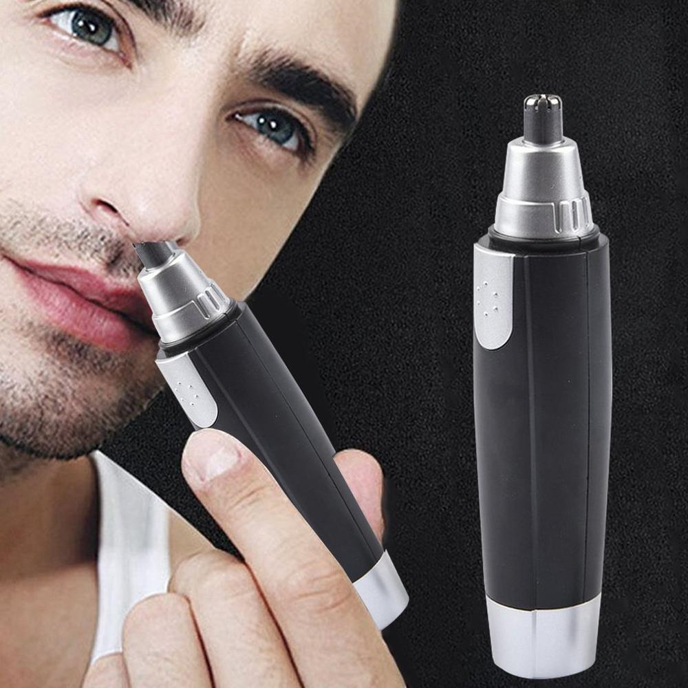 Man using the black waterproof nose and ear hair trimmer