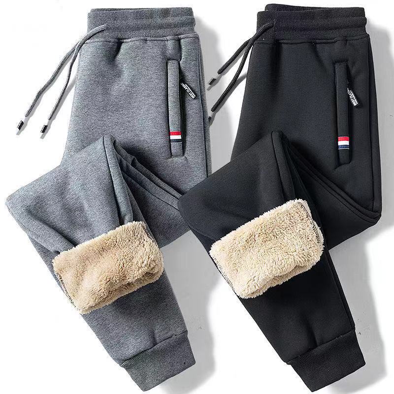 Grey and black thermal fleece-lined trousers folded together