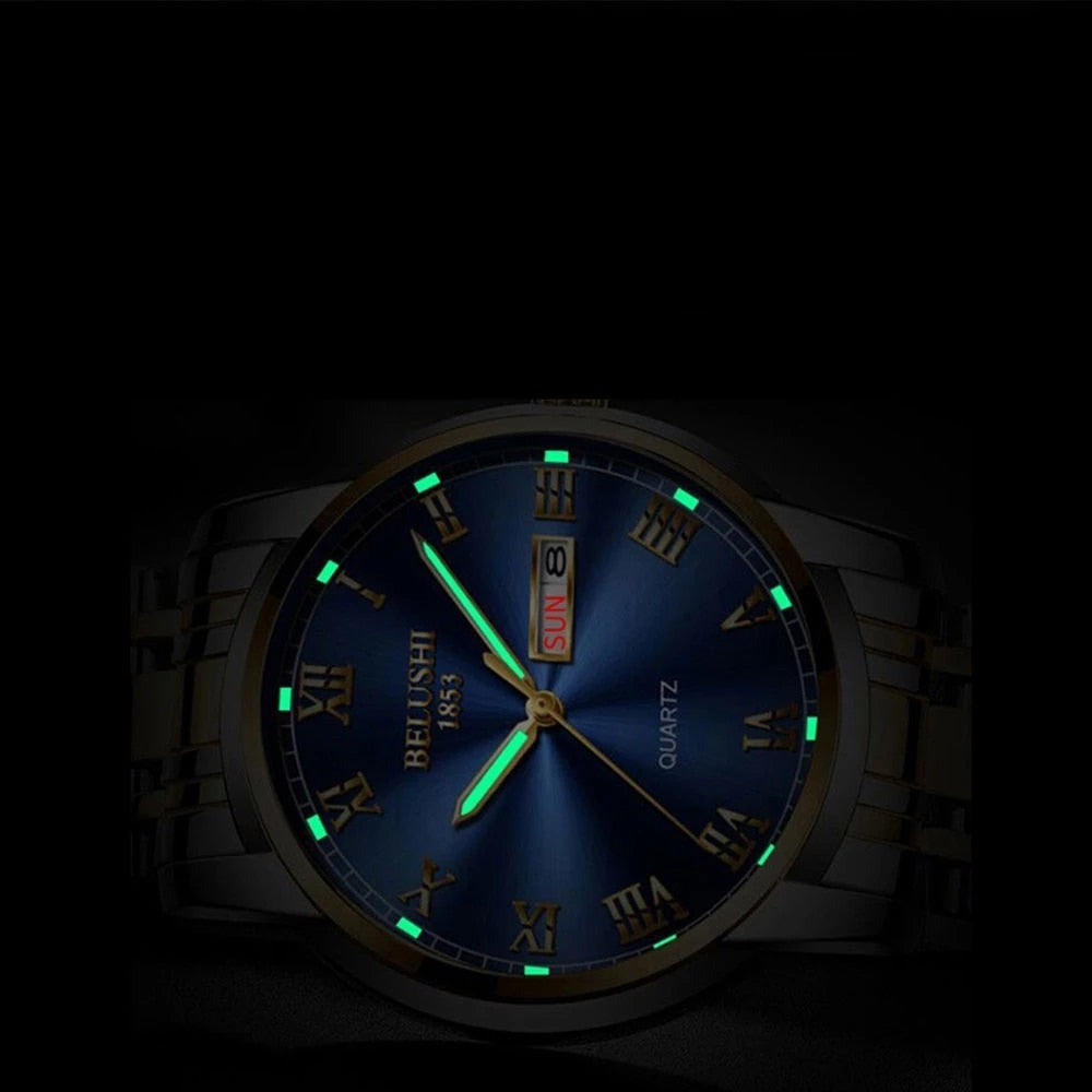 Mens accessory collection featuring the stainless steel watch on a stand