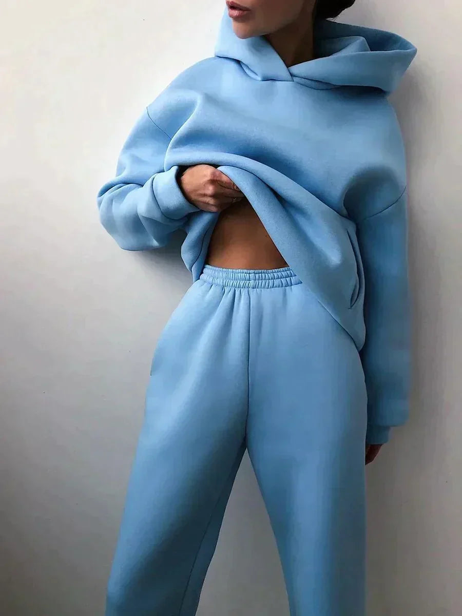 Flat lay of the women's two-piece hoodie set arranged neatly for styling inspiration