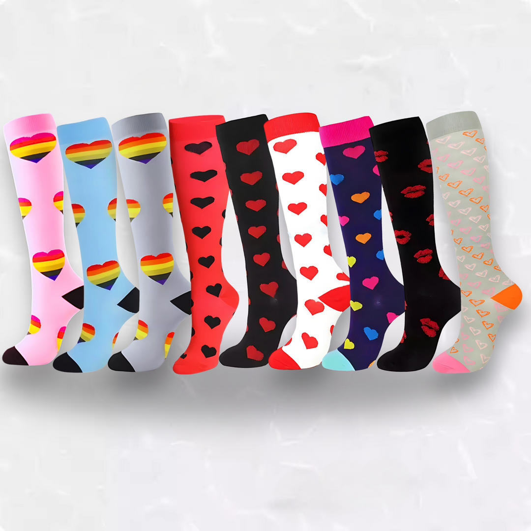 Display of eight different colorful compression socks featuring various heart prints and colorways