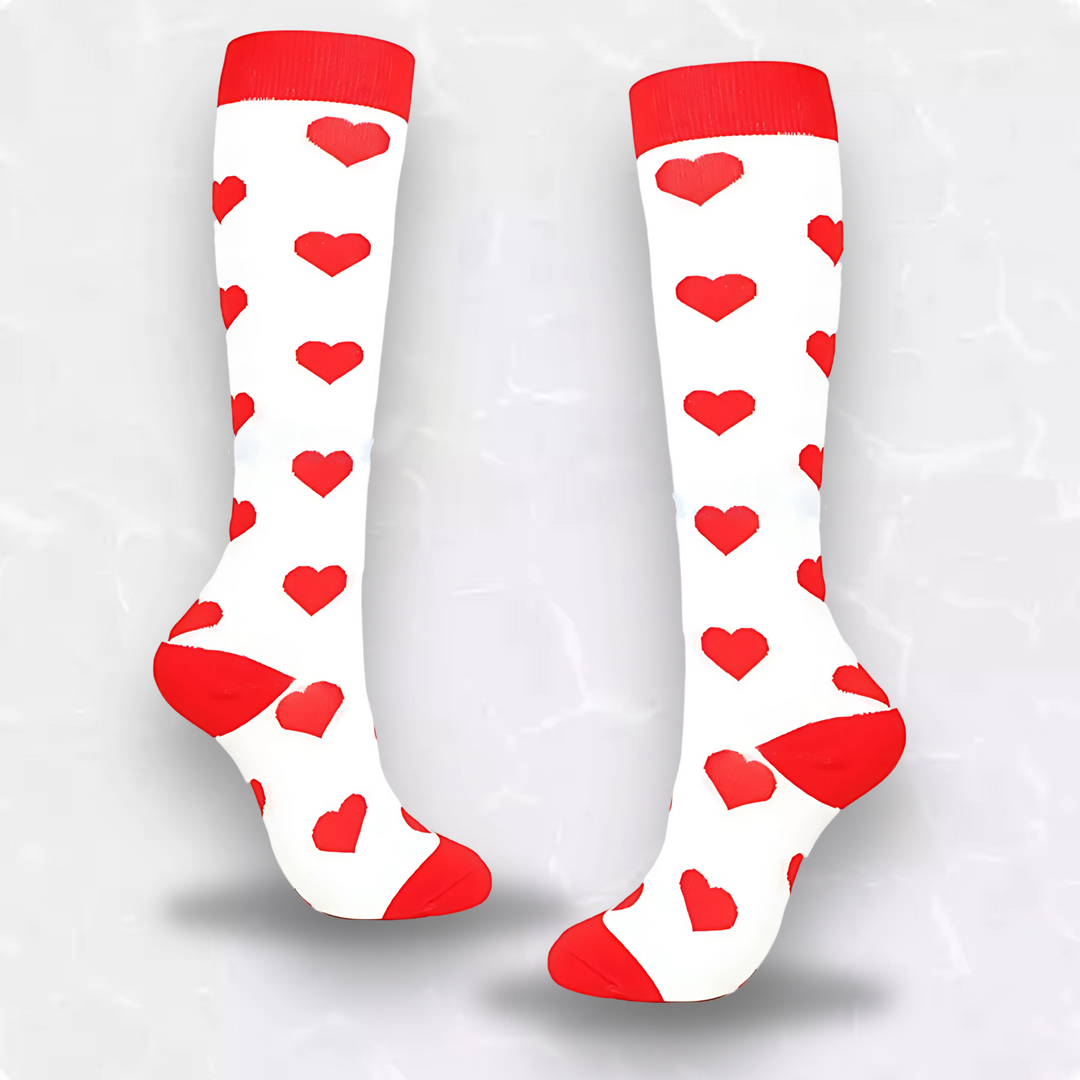 Athletic compression socks with cute heart design worn by a woman outdoors