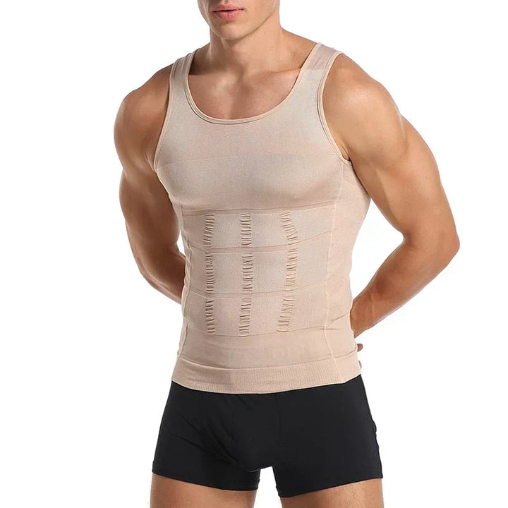 Man wearing a beige men's compression undershirt for seamless shapewear