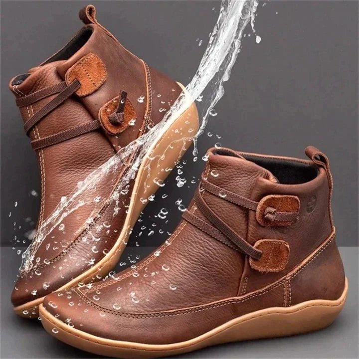 Women's orthopaedic comfort ankle boots showing durable outsole tread and grip for winter walking.