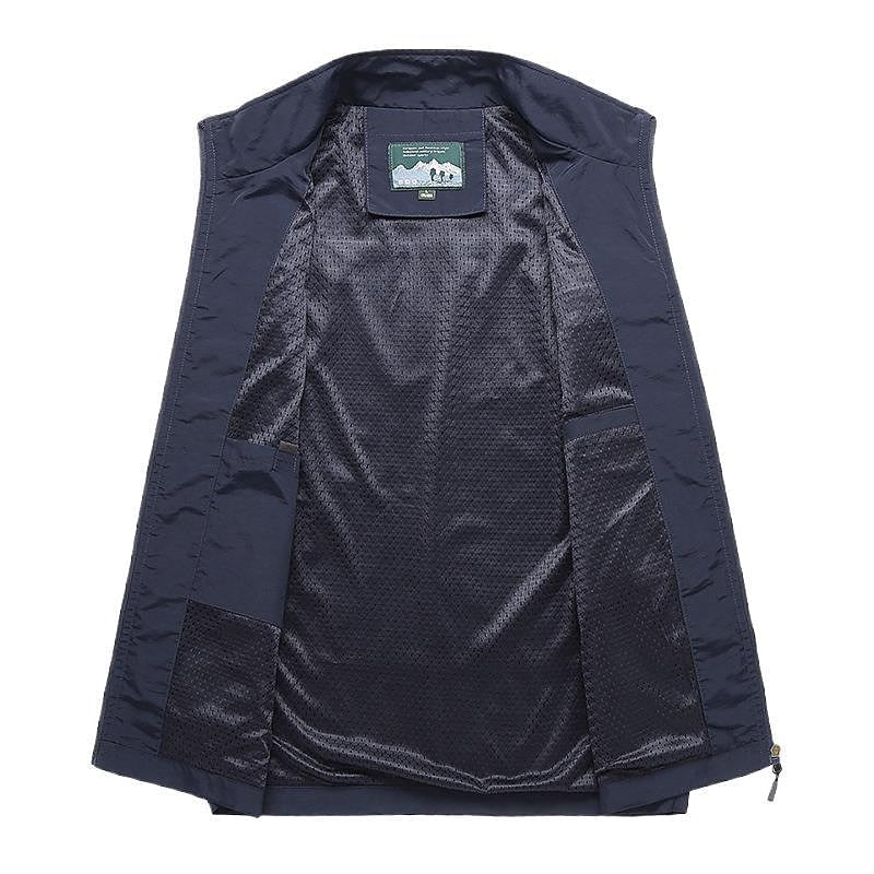 Back view of mens outdoor utility vest showing activewear fit and lightweight outerwear design