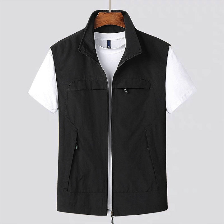 Men's black water-repellent zip utility vest front view