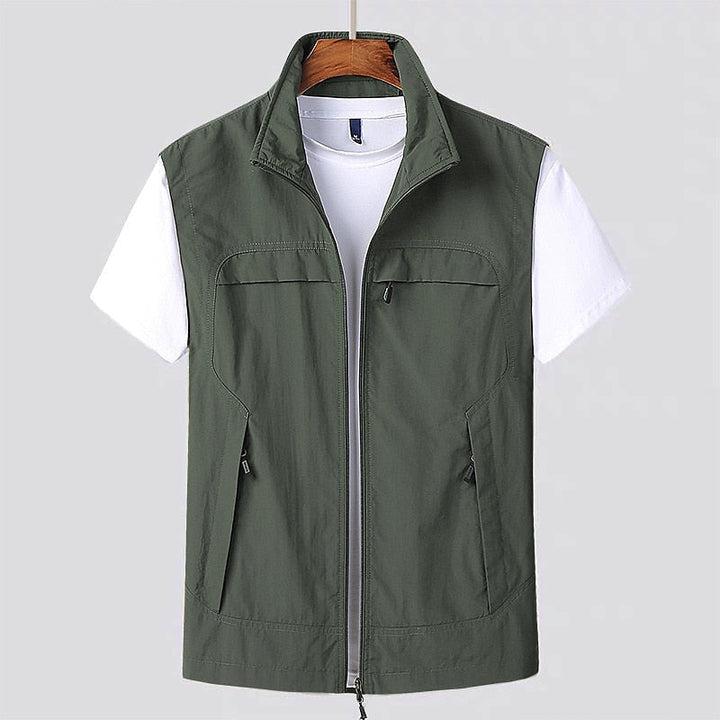 Men's dark green water-repellent zip utility vest front view