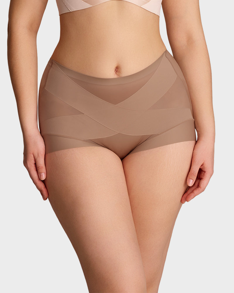Side view of woman wearing seamless shapewear briefs for a smooth silhouette