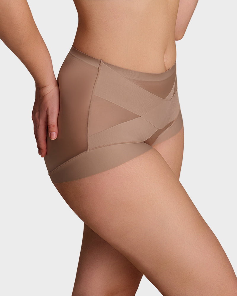 Assorted color high-waist shaping panties showing elastic waistband stretch