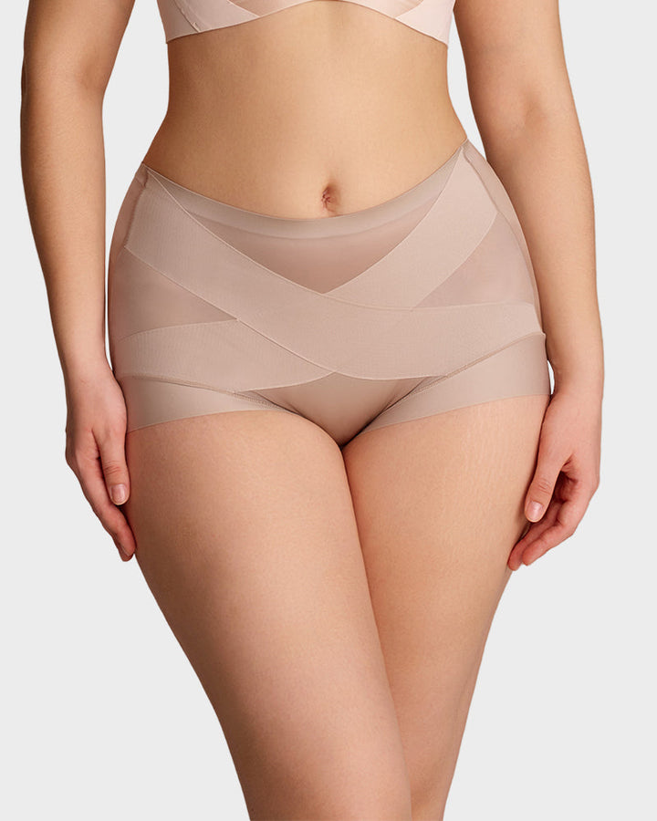 Nude womens underwear featuring a high waist and seamless daily shaping