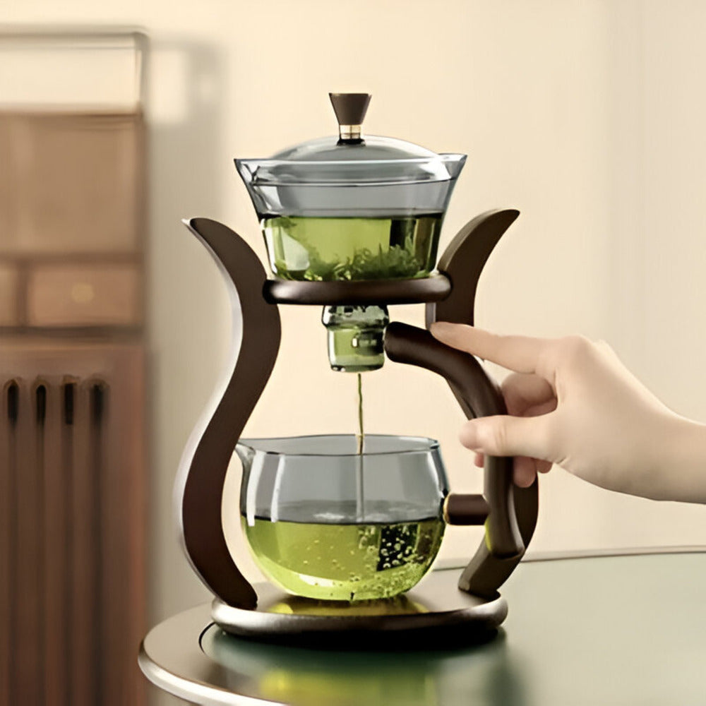 Close-up of artisan teapot with magnetic pouring mechanism in action