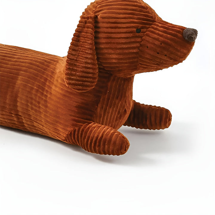 Decorative dachshund plush cushion styled on a modern armchair