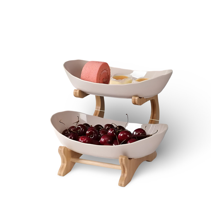 Elegant black wire tier tray styled on a wooden kitchen island