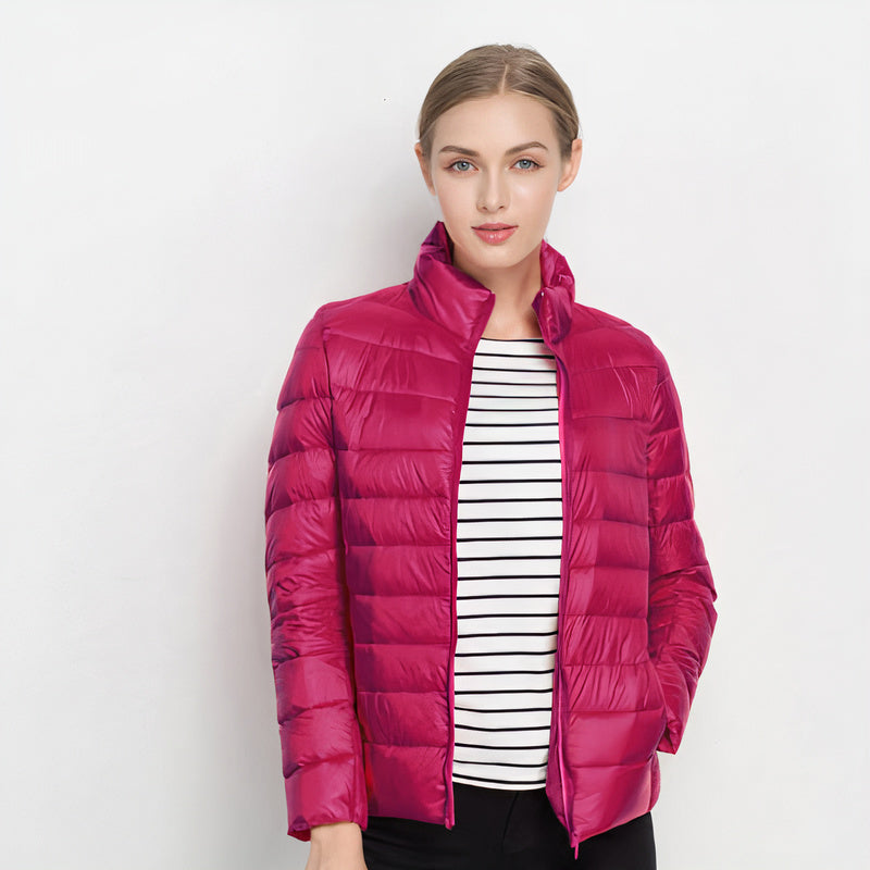 Model wearing fuchsia lightweight urban chic women down jacket over striped top