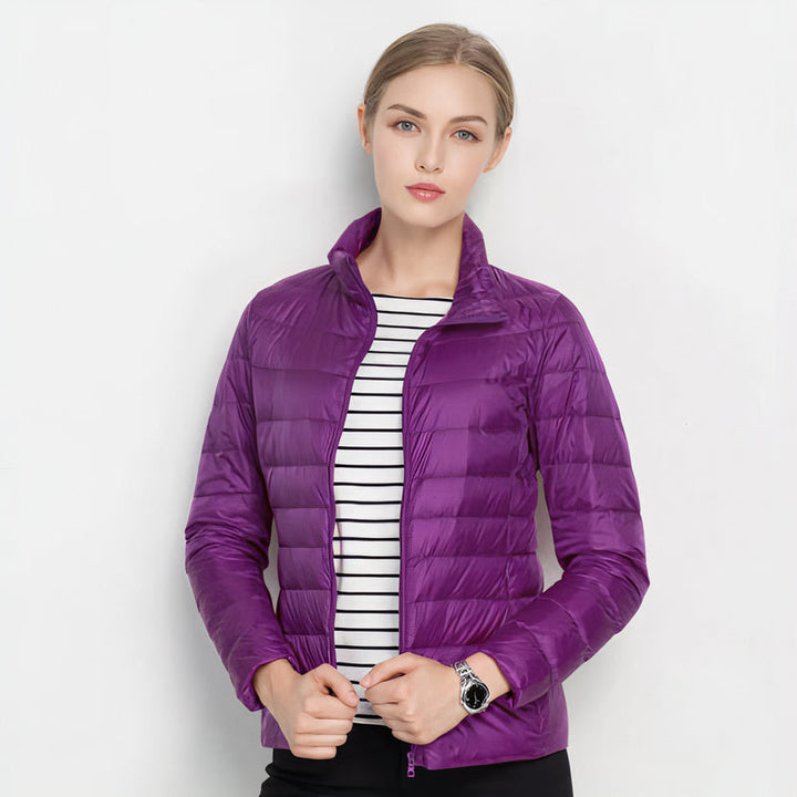Back view of women's urban chic lightweight winter jacket
