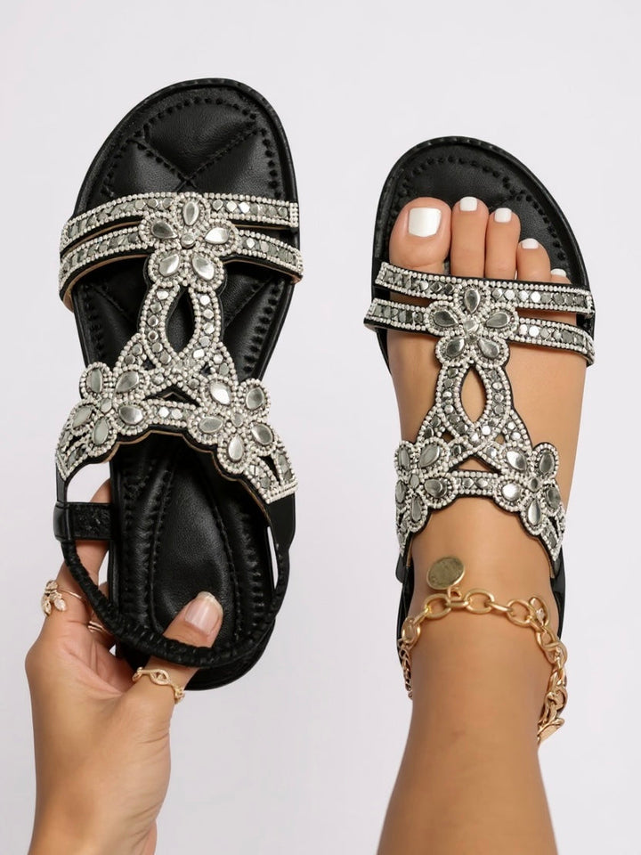 Womens shimmering flat sandals featuring cushioned footbed