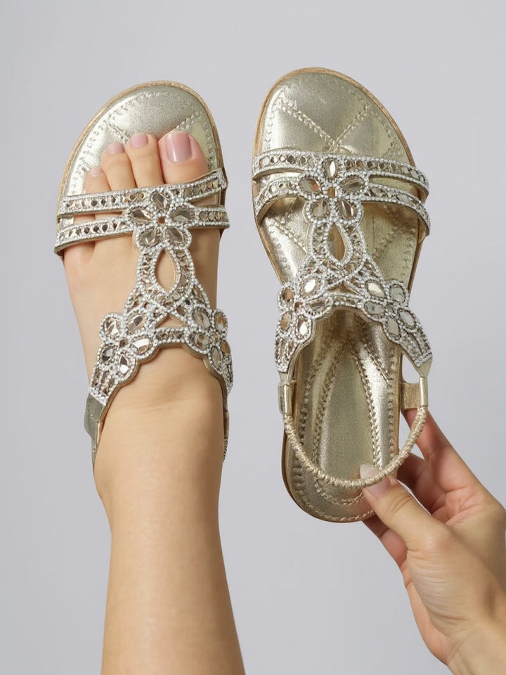 Dipped toe shape and glitter strap detail on womens flat sandals