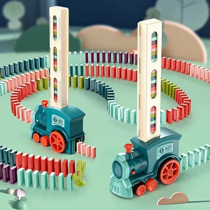 Two Domino Train toys set up with colorful tracks