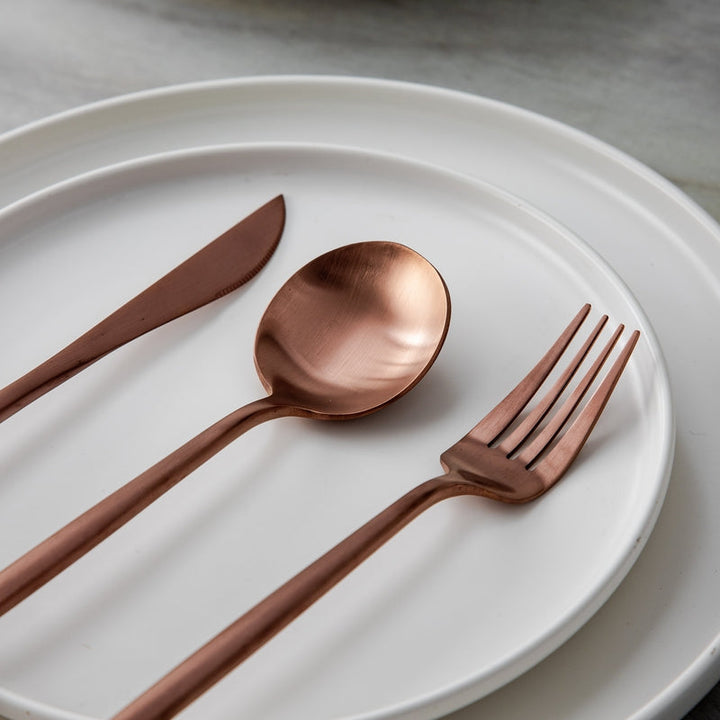 Sleek metallic tableware handles offering a comfortable and balanced grip