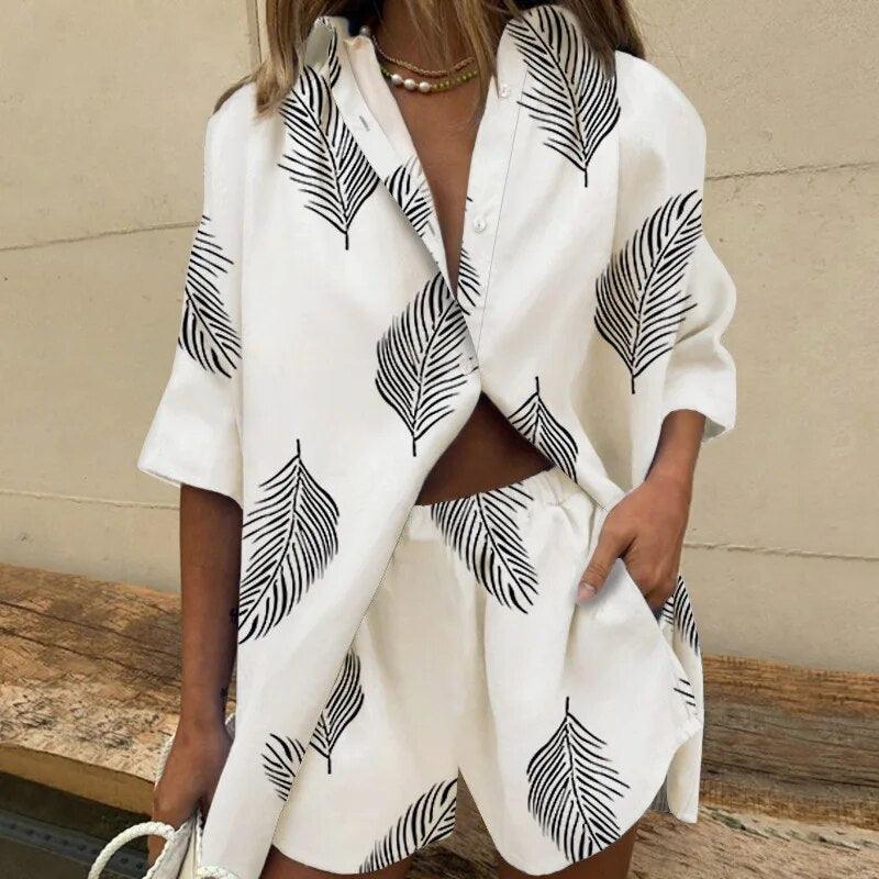 Women's leaf print blouse and shorts set showcasing the back view of the summer vacation outfit