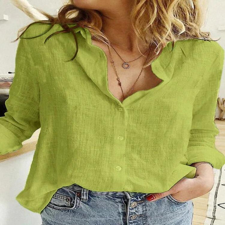 Stylish women's blouse showcasing button-down collar and relaxed fit