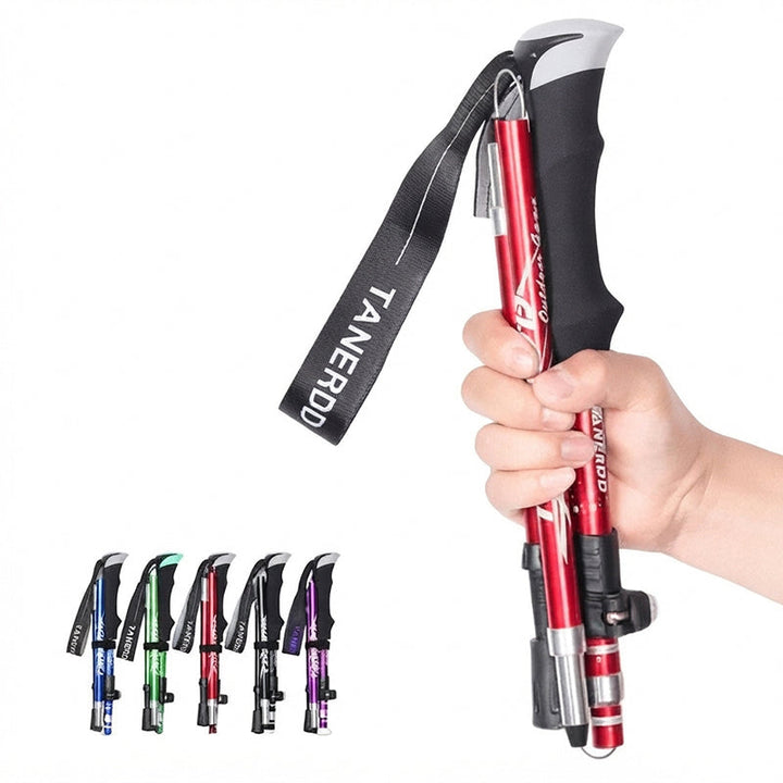 Folding trekking pole being held in hand showing compact folded size and color options