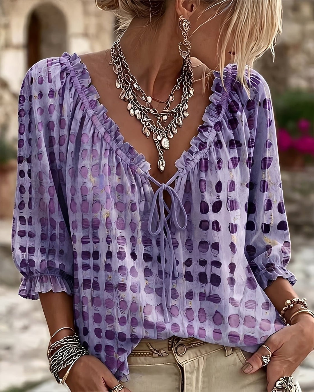 Back view of the trendy summer polka-dot blouse for office wear