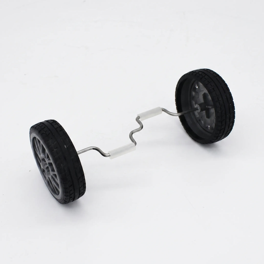 Interactive rolling bird toy with black wheels and silver axle on white background