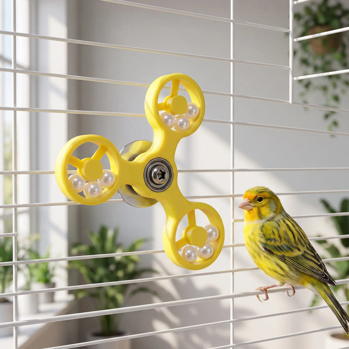 Canary bird looking at the yellow spinning bird toy inside a cage