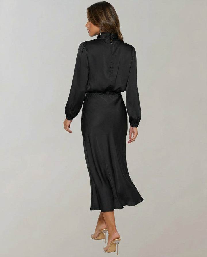 Women's elegant luminous long-sleeve midi dress front view for formal evening wear