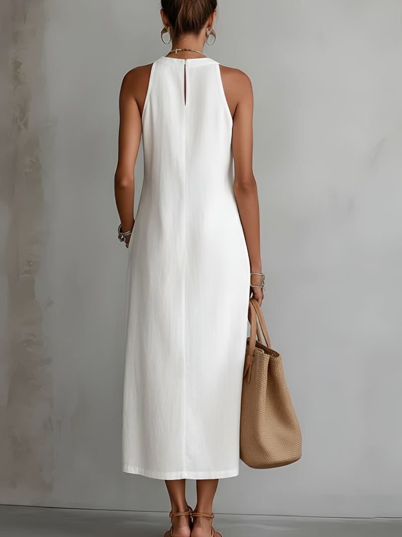Back view of a sleeveless embroidered summer midi dress for women
