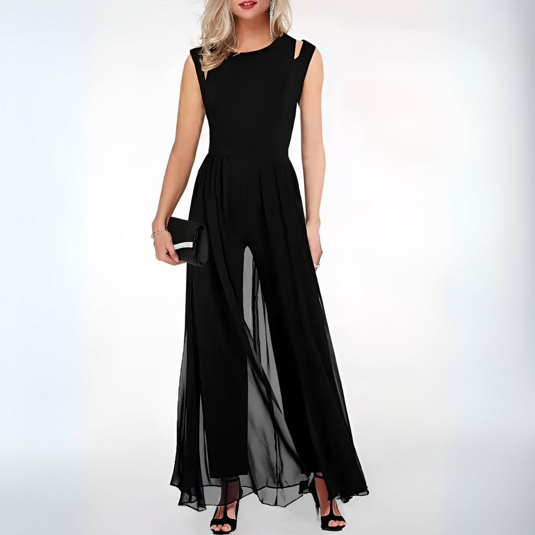 Front view of a woman wearing an elegant black sleeveless party jumpsuit with flared legs