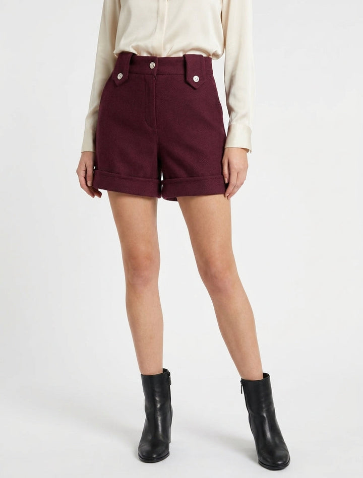 Burgundy women's high-waisted straight winter shorts styled for casual winter fashion.