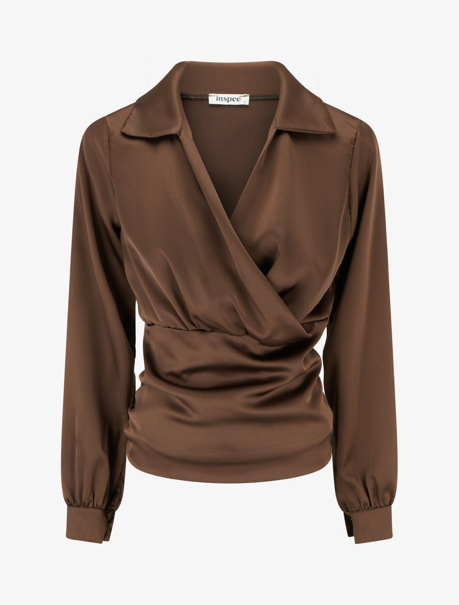 Front view of brown satin long sleeve wrap top with collar