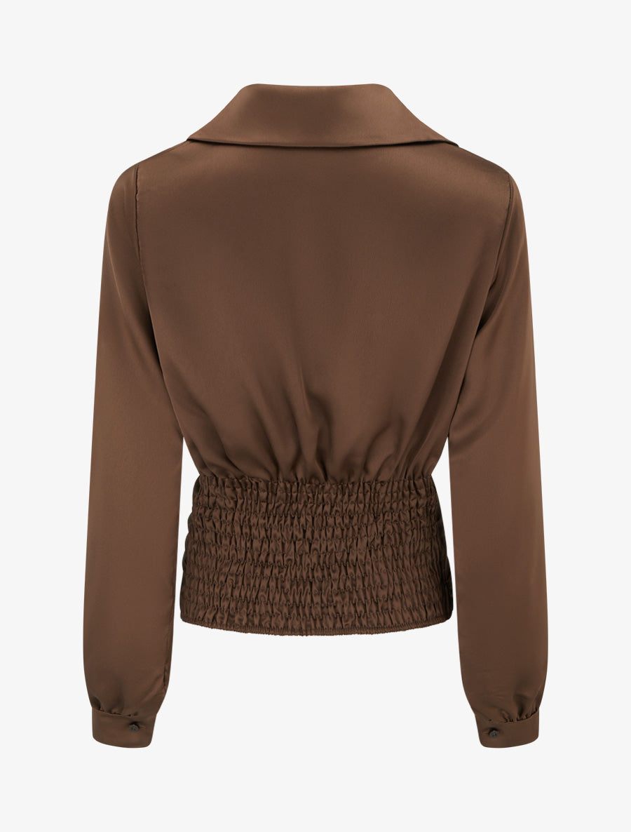 Back view showing elasticated smocked waistband of the satin top