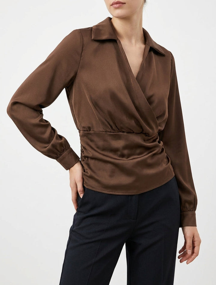 Brown satin long sleeve wrap top showcasing chic fall fashion and cuff detail