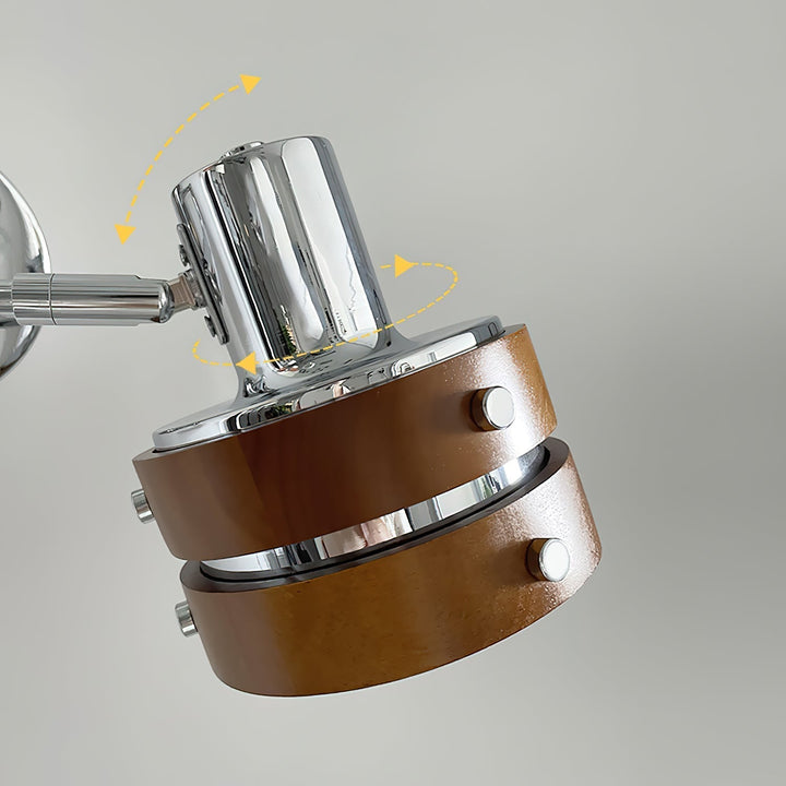 Close-up view of the adjustable chrome and walnut lamp head