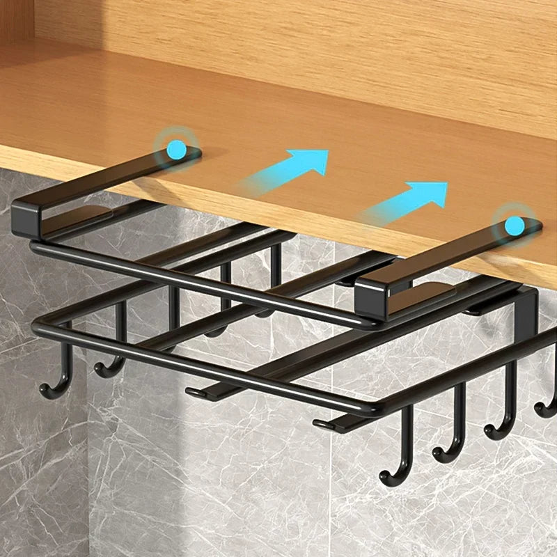 Close-up of hanging rack installed under cabinet for efficient kitchen organization