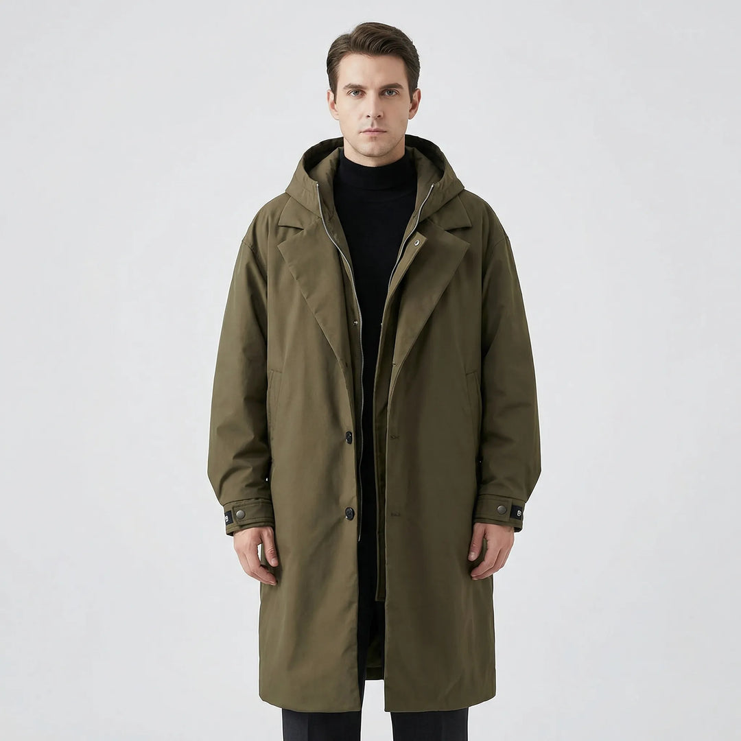 Full front view of a man modeling the green parka trench coat