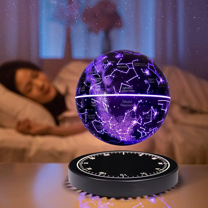 Unique gift star map night light floating above its sleek modern electromagnetic base