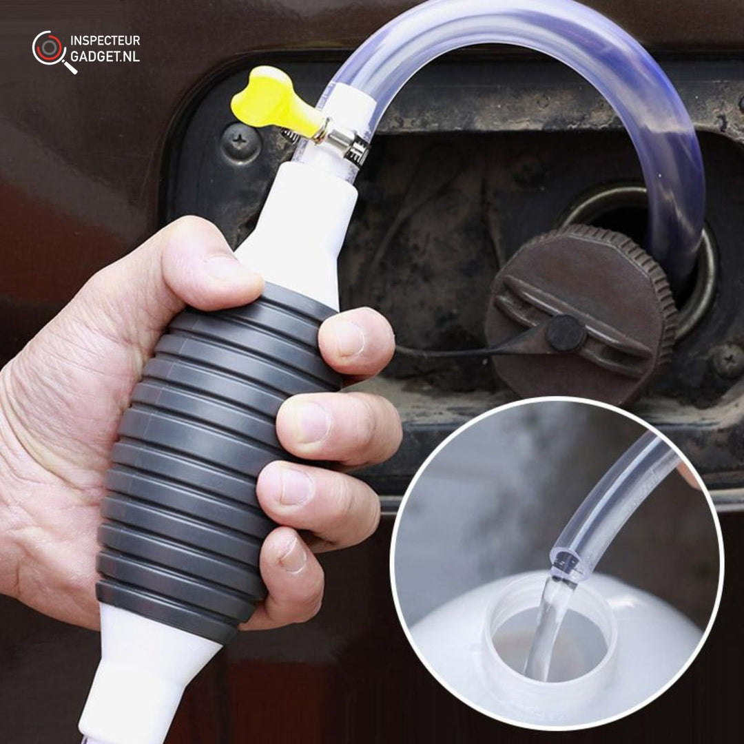 Hand squeezing the manual siphon pump bulb while transferring liquid into a container