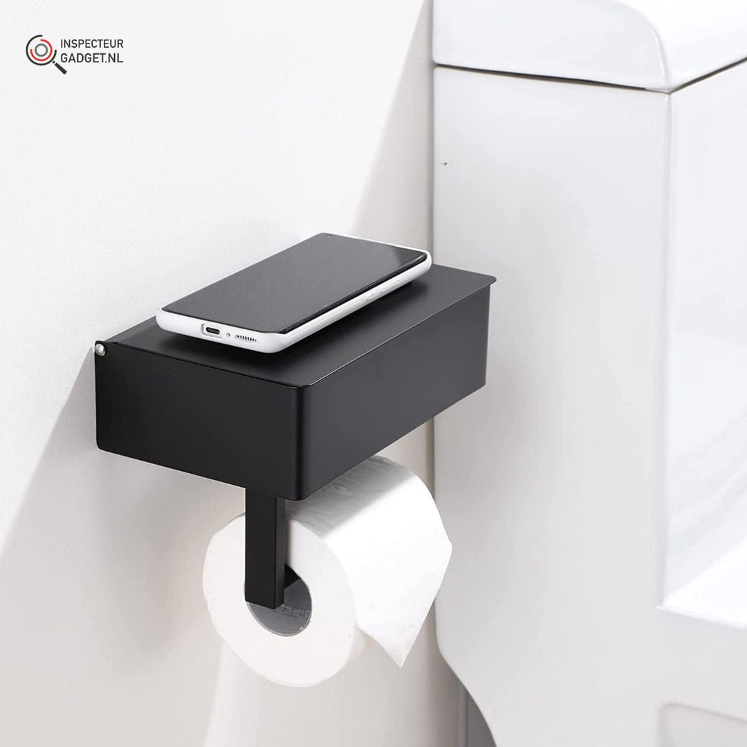 Black steel toilet roll holder with a smartphone placed on top shelf