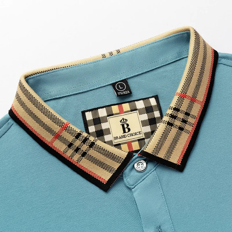 Close-up view of the blue polo shirt collar showing brand label and patterned lining