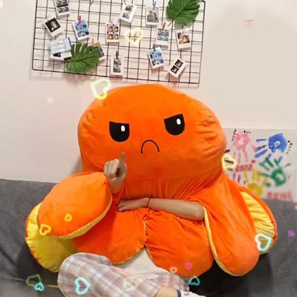 Child holding soft octopus toy as a comforting cuddle companion