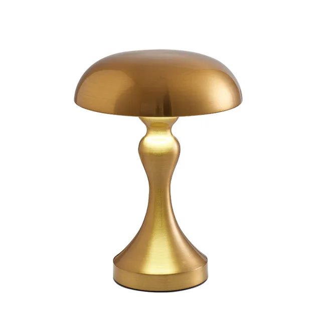 Modern bedroom decor table lamp casting a warm glow on a surface
