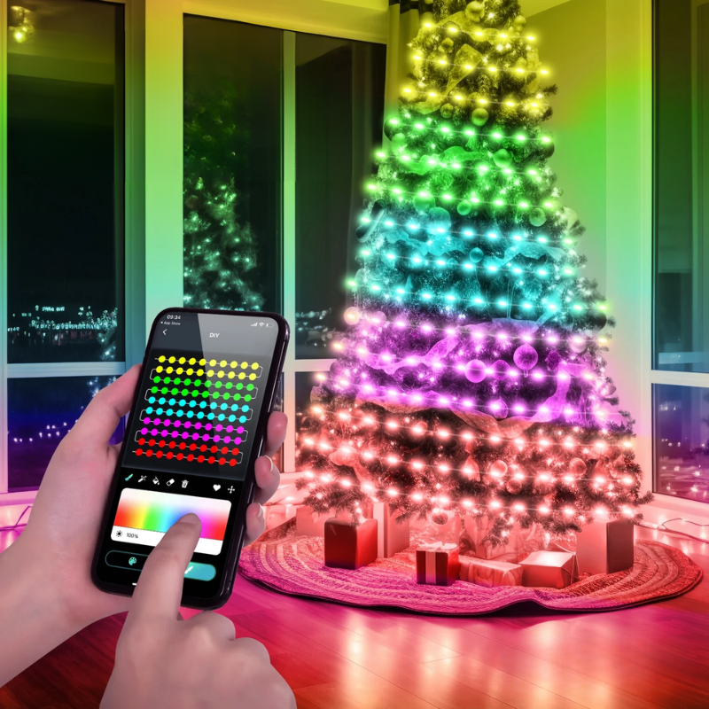 Person using a smartphone app to control colorful RGBIC fairy lights on a Christmas tree