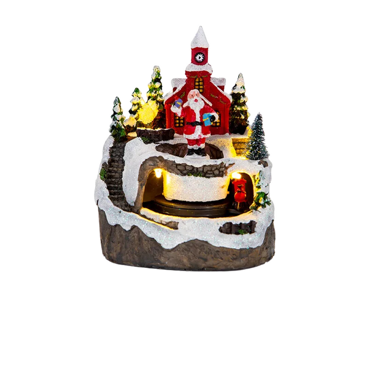 Close-up of the animated Santa figurine in the Christmas village